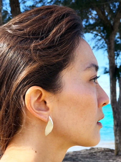 Maresse Moon Slice Earrings Large Sterling Silver wearing ocean background