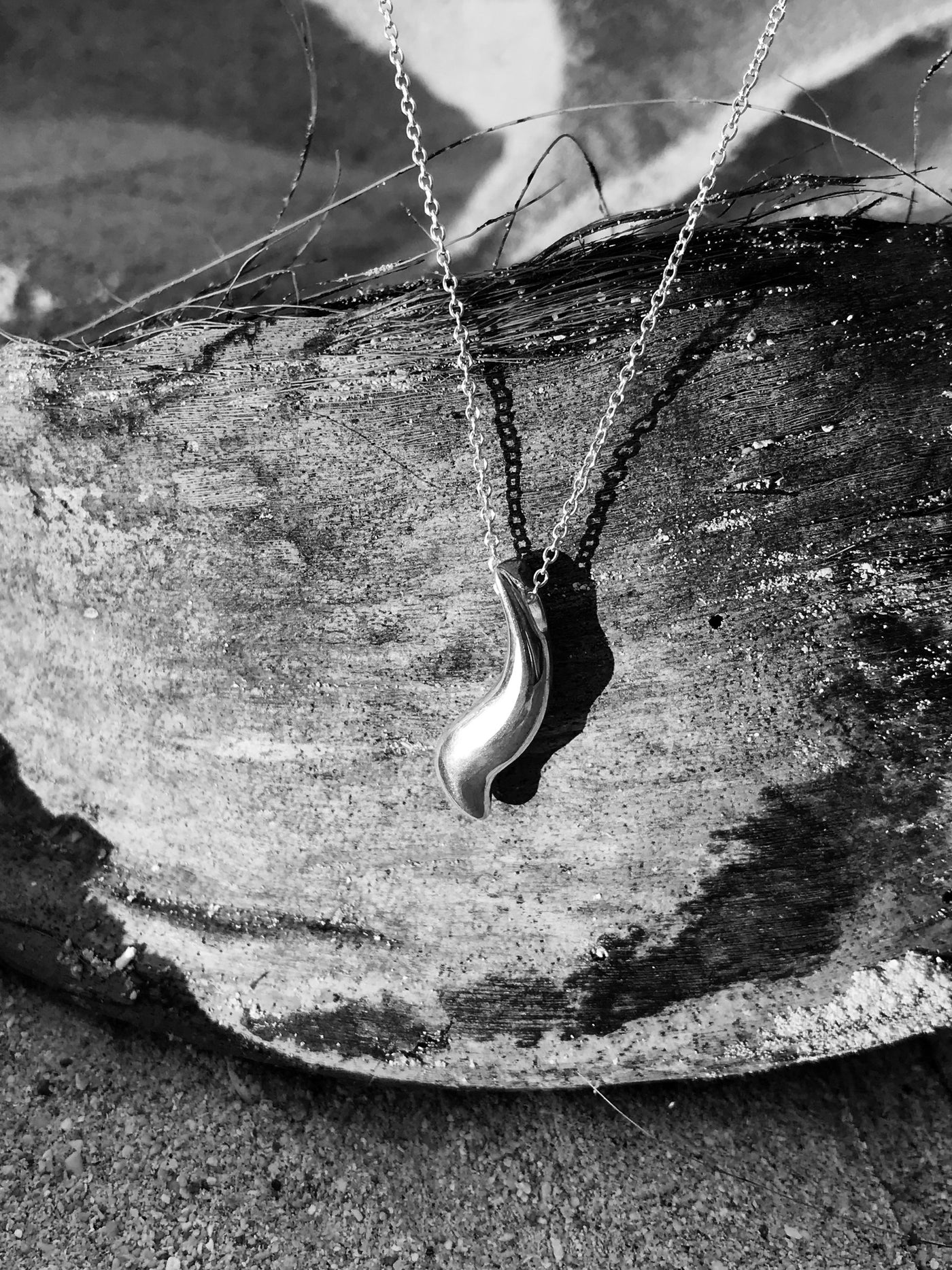 Maresse Wave Necklace Sterling Silver beach background